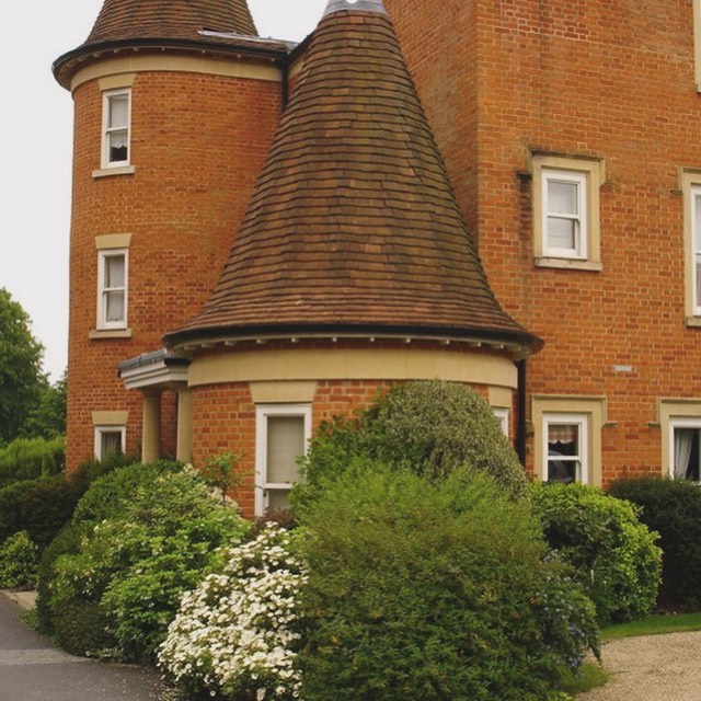 Guttering on a round brick turret from Cotswold Rainwater Services